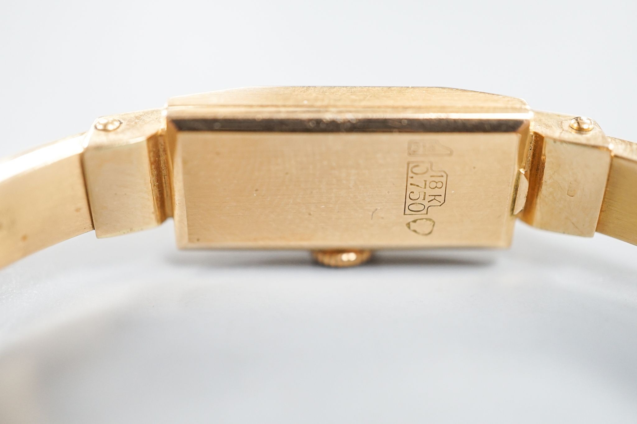 A lady's 18k Verbena open hinged bangle manual wind wrist watch